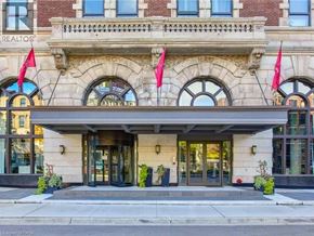 Hamilton condo for rent - The front of a building with the word REALTOR on it.