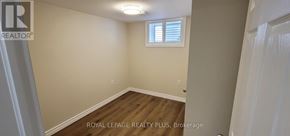 Hamilton (Inch Park) apartment for rent - A room with a window and wooden floors is for sale.