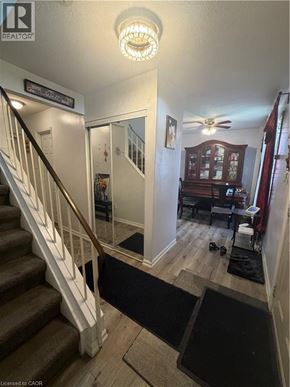 Hamilton condo for rent - A staircase with a black mat on the floor.