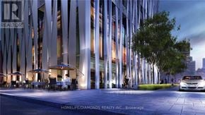 Toronto (Annex) condo for rent - A modern building with a glass facade and a sign that reads "REALTOR".