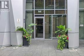 Toronto (Annex) condo for rent - Two potted plants sit in front of a glass door.