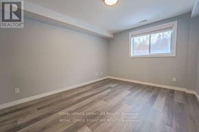 Pickering (Liverpool) apartment for rent - A room with a window and wooden flooring is for sale.