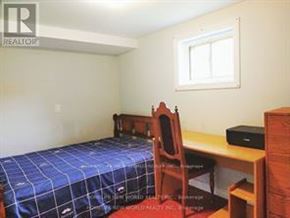 Toronto (Don Valley Village) apartment for rent - A bedroom with a bed, desk, chair and window.