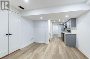 Brampton (Northwest Brampton) apartment for rent - A realtor photo of a kitchen and living room.