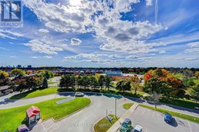 Toronto (Milliken) condo for rent - A kitchen with white cabinets and black appliances.