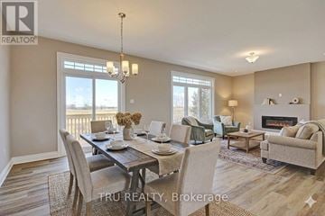 Ottawa duplex for rent - A well-lit living room with a dining table and chairs.