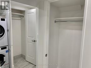 Toronto (Yorkdale-Glen Park) apartment for rent - A white door is in a white room.