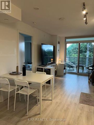 Toronto (Yorkdale-Glen Park) condo for rent - A dining room with a table and chairs.