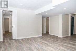 Haldimand apartment for rent - A brokerage image of a room with wood flooring and white walls.