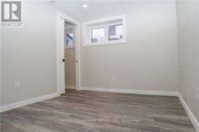 Haldimand apartment for rent - A room with a wooden floor and a window.