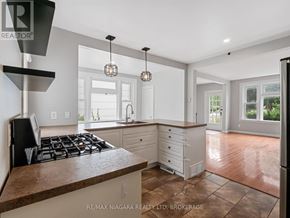 Fort Erie (Ridgeway) apartment for rent - A kitchen with a stove top oven and a counter top.