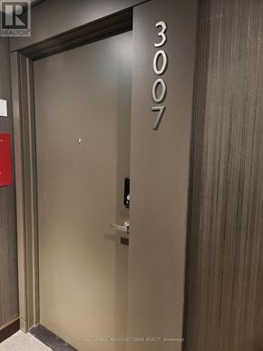 Mississauga (City Centre) condo for rent - A door with the number 3007 on it.
