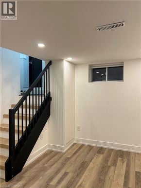 Hamilton apartment for rent - A room with a staircase and a window.