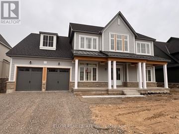 Oro-Medonte apartment for rent - A house with a grey roof and a white garage door.