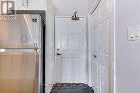 Burlington (Uptown) condo for rent - A white door with a number 4 on it.