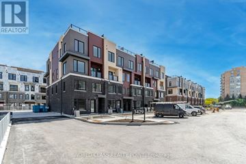 Mississauga (Erin Mills) townhouse for rent - A building with the number 3429 on it is part of a World Class Realty development.