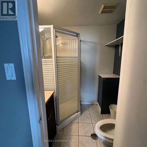 Clarington (Bowmanville) apartment for rent - A room with a wooden floor and a wooden box on it.