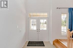 Southgate apartment for rent - A white interior with a door and a window.