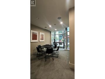Vancouver apartment for rent - A conference room with a table and chairs.