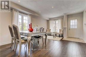 Markham (Greensborough) townhouse for rent - A dining room with a table set for four.