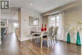 Markham (Greensborough) townhouse for rent - A dining room with a table set for four.