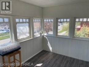 Brantford apartment for rent - A room with a window seat and a view of the outside.