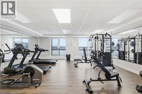 Stoney Creek condo for rent - A gym with treadmills, elliptical machines, and weight machines.