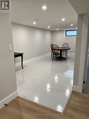 Toronto (Willowridge-Martingrove-Richview) apartment for rent - A room with a table and chairs in it.