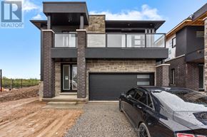 Niagara Falls (Marineland) apartment for rent - A black car is parked in front of a modern house.