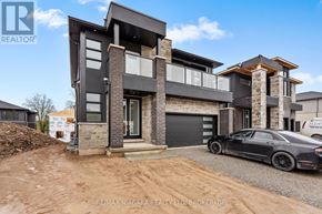 Niagara Falls (Marineland) apartment for rent - A modern house with a black car parked in front.