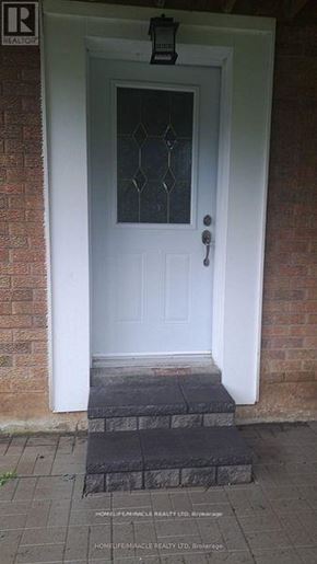 Richmond Hill (Bayview Hill) apartment for rent - A white door with a glass window above the door.