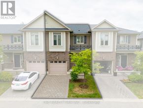 London North (North B) house for rent - A white car is parked in front of a house.