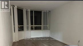 Toronto (Kennedy Park) condo for rent - A room with a window and a sign that says REALTOR.
