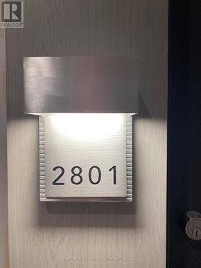 Toronto (Willowdale East) condo for rent - A door with a number plate on it that says 2801.