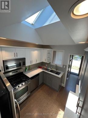 Toronto (Clairlea-Birchmount) apartment for rent - A kitchen with a skylight and stainless steel appliances.