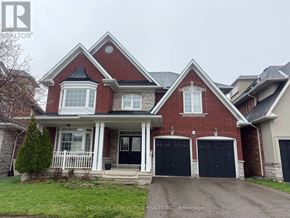 Aurora apartment for rent - A red brick house with a black door and windows.