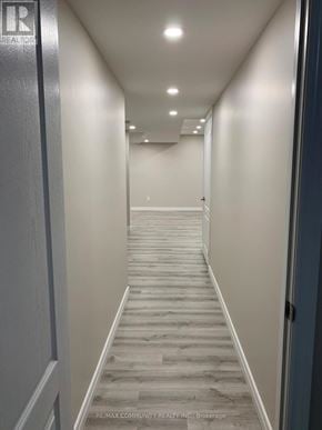Ajax (Northeast Ajax) apartment for rent - A hallway with a wooden floor and white walls.