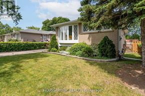 Richmond Hill (Harding) apartment for rent - A house with a lawn in front of it.
