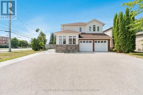 Orillia apartment for rent - A large house with a garage is for sale.