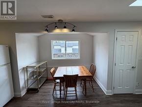 Guelph (Exhibition Park) apartment for rent - A dining room with a table and chairs.