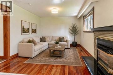 Milton apartment for rent - A living room with a white couch and a coffee table.