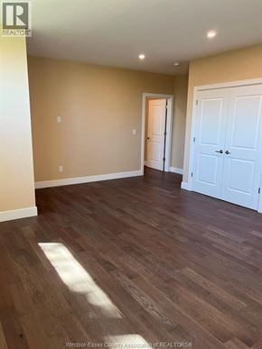Lasalle apartment for rent - A room with wooden floors and white doors.