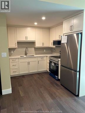 Lasalle apartment for rent - A kitchen with a refrigerator, microwave, and oven.