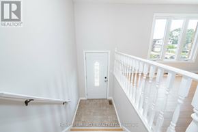Welland (N. Welland) apartment for rent - A white door in a room with a window above it.