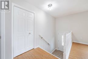 Welland (N. Welland) apartment for rent - A white door is on the left and a white staircase with a railing is on the right.