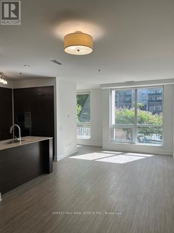Toronto (Forest Hill South) house for rent - A modern kitchen with a sink and a window.