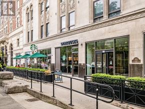 Hamilton (Beasley) condo for rent - A building with a sign that says "RE/MAX ESCORT" on it.