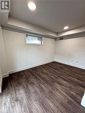 Niagara Falls townhouse for rent - A room with wood flooring and a window.