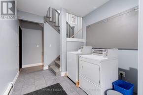 Hamilton (St. Clair) apartment for rent - A room with a staircase and a white cabinet.