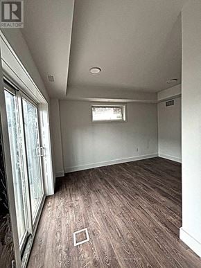 Niagara Falls (Oldfield) townhouse for rent - A room with a window and wooden flooring.